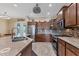 Modern kitchen with an island, stainless steel appliances, and ample cabinet space at 191 Brig W Cir, Placida, FL 33946