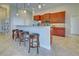 Modern kitchen with granite countertops and wood cabinets at 20 Mate Cir, Placida, FL 33946