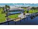 Single-story house with pool and canal access; desirable waterfront property at 15418 Alcove Cir, Port Charlotte, FL 33981