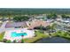 Aerial view of community amenities, including pool and tennis courts at 740 Summersea Ct, Englewood, FL 34223