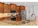 Kitchen with granite countertops and stainless steel appliances at 15964 Viscount Cir, Port Charlotte, FL 33981