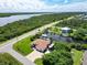 Aerial view of canal front property with large home and RV at 15964 Viscount Cir, Port Charlotte, FL 33981