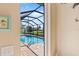 Inviting screened pool with ample patio space at 15964 Viscount Cir, Port Charlotte, FL 33981