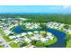 Aerial view of community with lake and ocean access at 740 Summersea Ct, Englewood, FL 34223