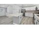 Modern kitchen with island and stainless steel appliances at 740 Summersea Ct, Englewood, FL 34223