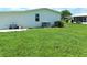 Large backyard with grassy area at 6246 Parakeet Rd, Englewood, FL 34224