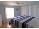 Spacious main bedroom with large bed and ample closet space at 6246 Parakeet Rd, Englewood, FL 34224