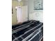 Second bedroom with full-size bed and access to hallway at 6246 Parakeet Rd, Englewood, FL 34224