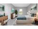 Main bedroom with large bed and window at 213 Antis Dr, Rotonda West, FL 33947