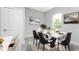 Bright dining room featuring a contemporary table and chairs at 213 Antis Dr, Rotonda West, FL 33947