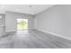 Spacious living room with sliding glass doors leading to backyard at 213 Antis Dr, Rotonda West, FL 33947