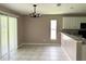 Bright dining area adjacent to the kitchen features sliding glass doors to the lanai at 35 Mark Twain Ln, Rotonda West, FL 33947