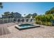 Community hot tub with lounge chairs and lush tropical landscaping in a resort-like setting at 6000 Boca Grande Cswy # D46, Boca Grande, FL 33921