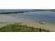 Stunning coastal waterfront view with nearby boat at 6000 Boca Grande Cswy # D46, Boca Grande, FL 33921