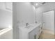 Contemporary bathroom with double sink vanity and modern fixtures at 9262 Genesee St, Port Charlotte, FL 33981