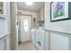 Convenient laundry room with washer, dryer, and exterior access at 6432 Keena Ct, North Port, FL 34287