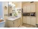 Clean bathroom with white cabinets and updated fixtures at 6432 Keena Ct, North Port, FL 34287