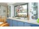 Built-in cabinets with a large mirror and decorative accents at 6432 Keena Ct, North Port, FL 34287
