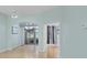Bright living room featuring access to a sunroom at 2024 Lynx Run, North Port, FL 34288