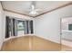 Spacious bedroom with wood floors and bay window at 2024 Lynx Run, North Port, FL 34288