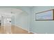 Living area with view into kitchen and access to other rooms at 2024 Lynx Run, North Port, FL 34288