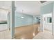 Spacious living room with light walls and laminate flooring at 2024 Lynx Run, North Port, FL 34288