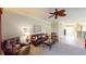 Spacious living room with a view of the lanai at 417 Tomoka Dr, Englewood, FL 34223