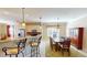 Kitchen with breakfast bar and dining area at 417 Tomoka Dr, Englewood, FL 34223