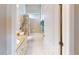 Clean bathroom with tub, shower, granite countertop, and vanity at 417 Tomoka Dr, Englewood, FL 34223