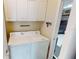 Convenient laundry room with washer and dryer at 417 Tomoka Dr, Englewood, FL 34223