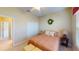 Guest bedroom with a double bed and en-suite bathroom at 417 Tomoka Dr, Englewood, FL 34223