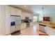 Bright kitchen with granite countertops and stainless steel appliances at 417 Tomoka Dr, Englewood, FL 34223