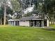 Two-building outbuildings, one with a screened shelter at 2573 Chynn Ave, North Port, FL 34286
