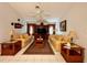 Cozy living room featuring two sofas and an entertainment center at 2573 Chynn Ave, North Port, FL 34286