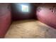 Empty horse stall with wood shavings and barred window at 2573 Chynn Ave, North Port, FL 34286