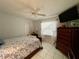 Spacious bedroom with a ceiling fan and plenty of natural light at 2573 Chynn Ave, North Port, FL 34286