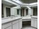 Spacious bathroom with double vanity and ample counter space at 2573 Chynn Ave, North Port, FL 34286