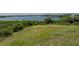 Landscaped backyard with waterfront view at 6000 Boca Grande Cswy # D46, Boca Grande, FL 33921