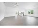 Bright and airy living area with tile floors and kitchen views at 9262 Genesee St, Port Charlotte, FL 33981