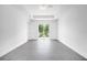 Large bedroom with sliding glass doors to backyard access at 9262 Genesee St, Port Charlotte, FL 33981