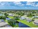 Community overview with canal and homes at 64 Long Meadow Ln, Rotonda West, FL 33947