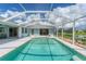 Relaxing screened pool with canal views at 64 Long Meadow Ln, Rotonda West, FL 33947