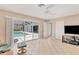 Gathering room with pool view and sliding glass doors at 64 Long Meadow Ln, Rotonda West, FL 33947