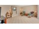 Relaxing Gathering room with tiled floors and comfortable seating at 64 Long Meadow Ln, Rotonda West, FL 33947
