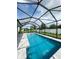 Refreshing screened pool perfect for relaxation at 5240 Willow Lake Ct, Sarasota, FL 34233