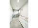 Elegant bathroom with double vanity, large shower, and marble countertops at 5240 Willow Lake Ct, Sarasota, FL 34233