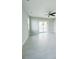 Living room with sliding glass doors opening to a view of the pool at 5240 Willow Lake Ct, Sarasota, FL 34233