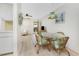 Dining area with view of living room and kitchen at 3 Quails Run Blvd # 8, Englewood, FL 34223