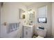 Clean bathroom with a vanity and a toilet at 9273 Carnation Ave, Englewood, FL 34224
