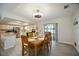 Kitchen with stainless steel appliances and light cabinets at 9273 Carnation Ave, Englewood, FL 34224